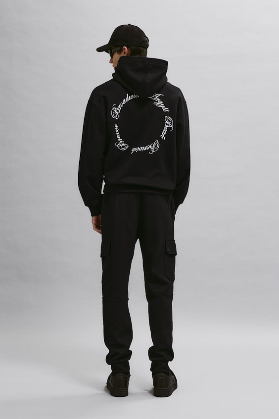 HM Bedruckter Hoodie in Oversized Fit Im Verkauf
