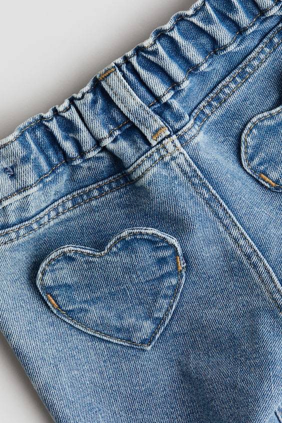 HM Jeans mit herzförmigen Taschen Bis zu 55% Rabatt
