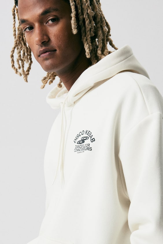 HM Bedruckter Hoodie in Oversized Fit Lagerräumung