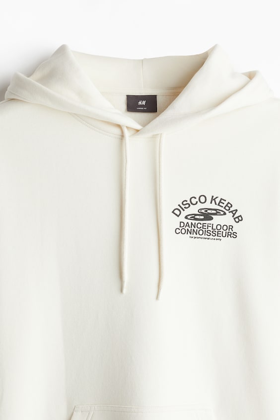 HM Bedruckter Hoodie in Oversized Fit Lagerräumung