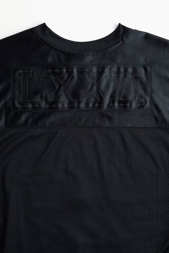 HM Loose Fit Printed sports top in DryMove™ Neueste Stile